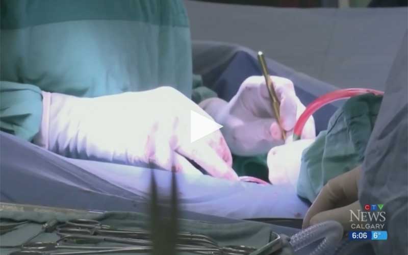 doctor performing hip surgery